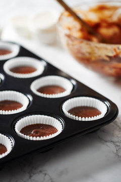 Making chocolate muffins