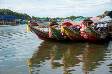 Fototapeta na wymiar the beautiful landscape with boats and reflection in the sea at Bang Chan, Ban Khlung, Chanthaburi, Thailand