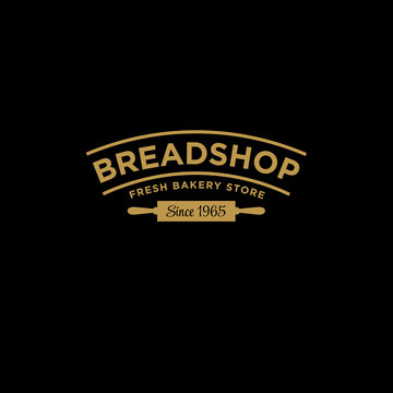 Bakery or Bread shop logo. Gold stamp logo isolated on black background.