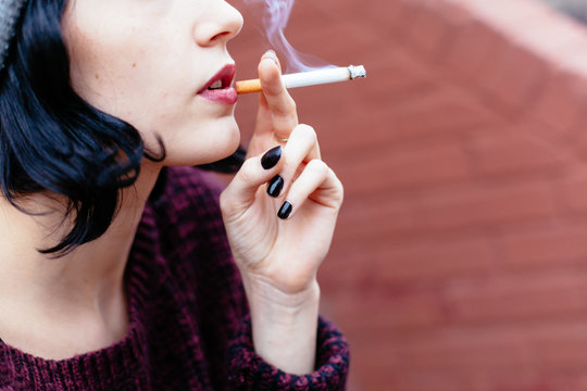 Woman Smoking a cigarette