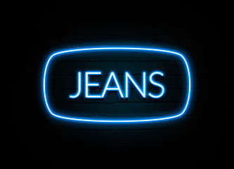 Jeans  - colorful Neon Sign on brickwall
