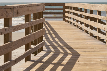 A wooden walkway leading down to Folly Beach SC