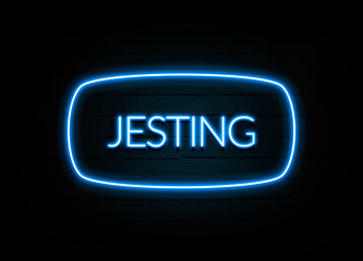 Jesting  - colorful Neon Sign on brickwall