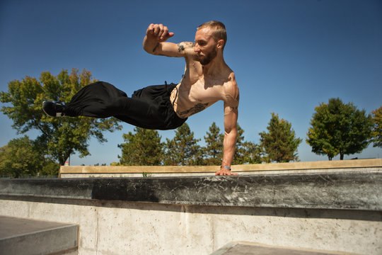 Young men freerunning