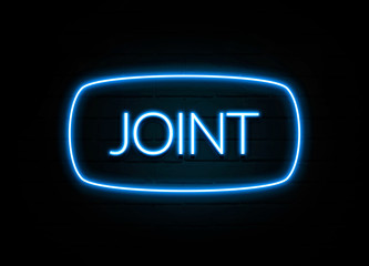 Joint  - colorful Neon Sign on brickwall
