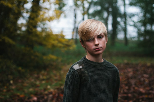 Autumnal portrait of a teenage boy.