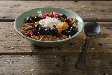 Bowl of breakfast cereals with spoon