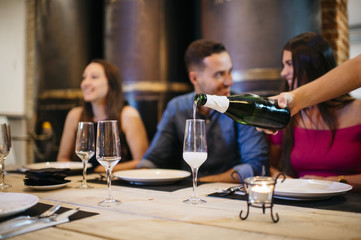 Enjoying dinner with friends.