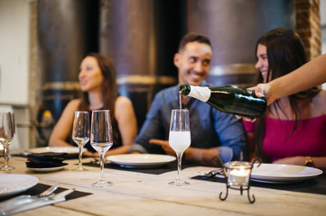 Enjoying dinner with friends.