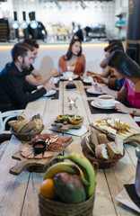 Enjoying dinner with friends.