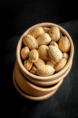 Almonds in a wooden bowl.