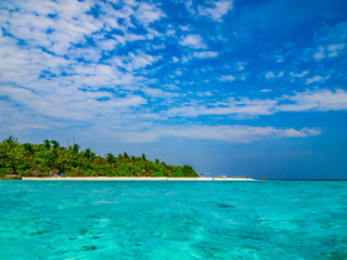 Tropical island vacation image, turquoise blue crystal clear water sea