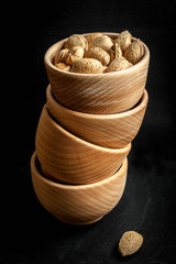 Almonds in a wooden bowl.