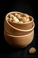 Almonds in a wooden bowl.