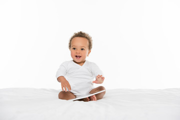 african american toddler with tablet