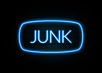 Junk  - colorful Neon Sign on brickwall