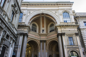 Fototapeta premium The Galleria Vittorio Emanuele II, one of the world's oldest shopping malls. Housed within a four-story double arcade, it is named after the first king of Italy