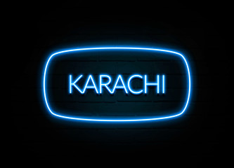 Karachi  - colorful Neon Sign on brickwall