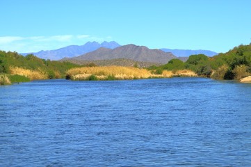 Fototapeta na wymiar Desert River with Blue Water