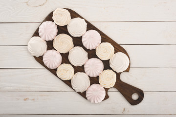 marshmallows on wooden board