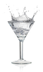 Water splashing in glass isolated on white background