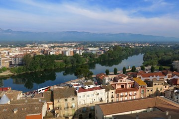 Tortosa, Catalonia, Spain skyline view over River Ebro with distant mountains