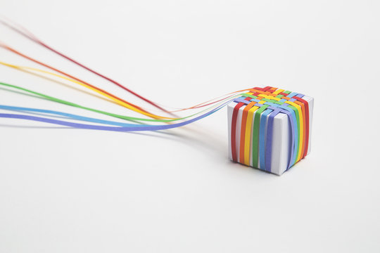 Woven rainbow paper covered cube
