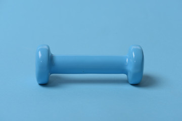 Health regime and fitness symbols. Barbell in small size, closeup