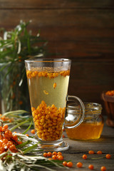 Cup of Winter tea with sea buckthorn
