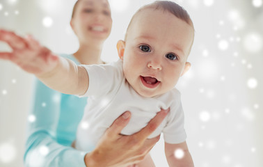 happy young mother with little baby