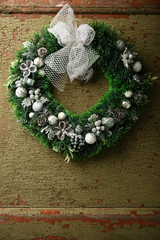 Christmas wreath on wood