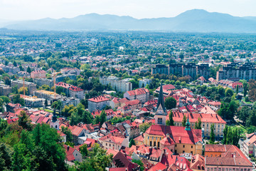 Fototapeta premium Slovenia, Ljubljana - panoramic view from the top of The Ljubljana Castle. Summer noon sun photo