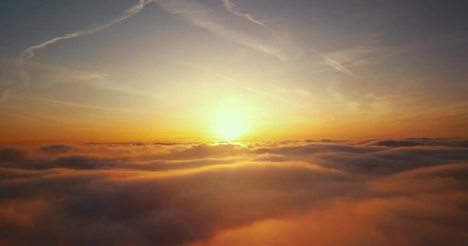 4K time lapse video of floating clouds in sunset