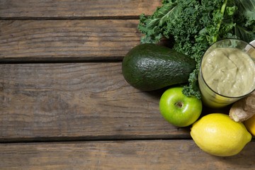Various ingredients and paste on wooden table
