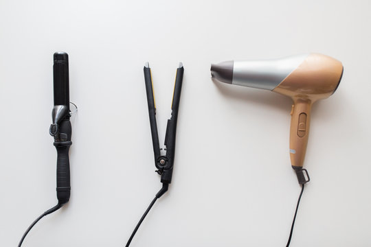 hairdryer, hot styler and curling iron or tongs
