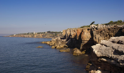 The coast of the Atlantic Ocean. Coast of the Lisbon Riviera. Grotto of the Devil