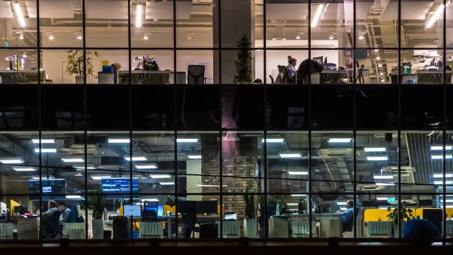creative office workers during operation and at the end of working day, time lapse