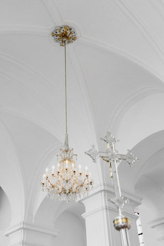 Elegant Chandelier on White Church Ceiling