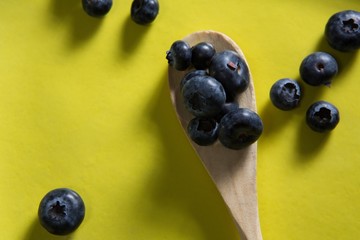 Blueberries in yellow plate