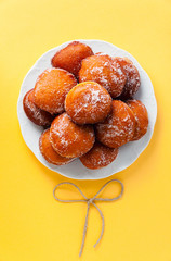 donuts filled with jam, marmalade or cream on a plate