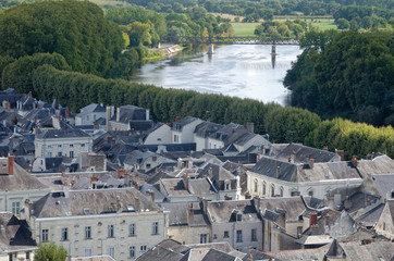 Obraz premium Aerial view of a french town by a riverside