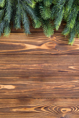 Christmas fir tree on the wooden board