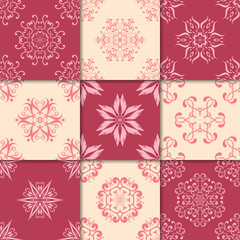 Cherry red and beige floral ornaments. Collection of seamless patterns