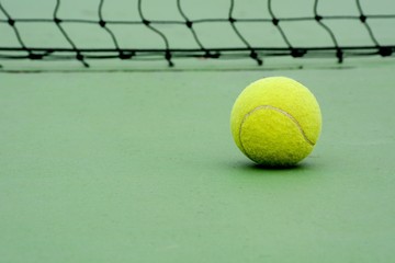 old tennis ball in the tennis court