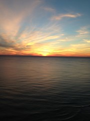 Fototapeta na wymiar Sunset over the ocean during spring.