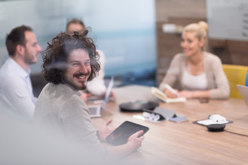 Startup Business Team At A Meeting at modern office building