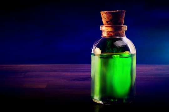 poison bottle on a wood surface