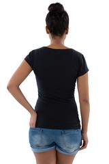Rear view of young woman with hand in pocket