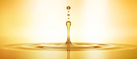 Fotobehang Tropfen aus goldenem Öl 3 © peterschreiber.media