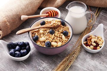 Oat flakes with milk, honey, blueberries, raspberries and nuts.